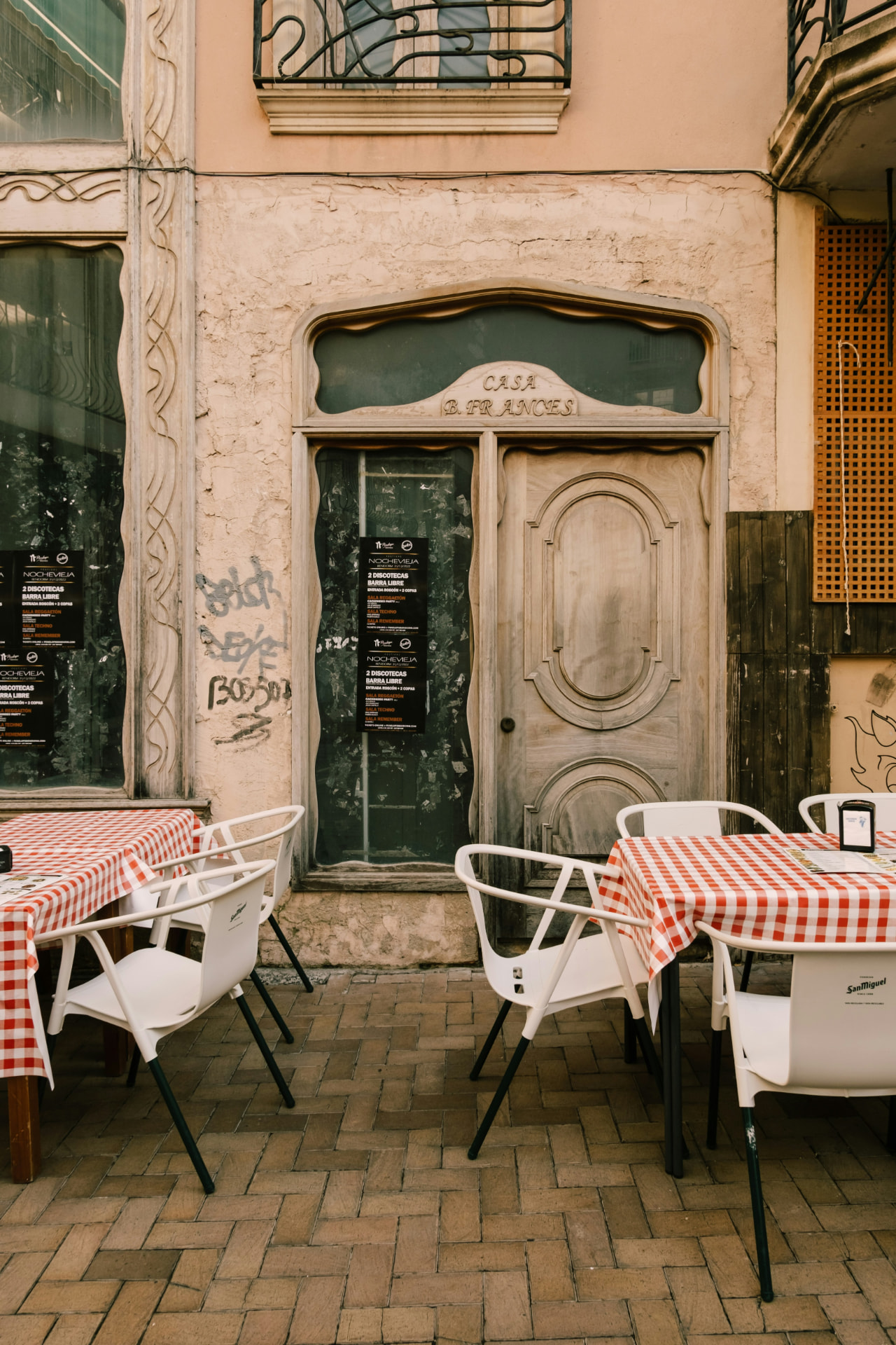 A café terrace on a quiet Spanish street